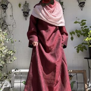 flared abaya, maroon, structured fabric with textured vertical grooves, flared sleeves and bodice, sleeve tie closures, button closure, button closure backing